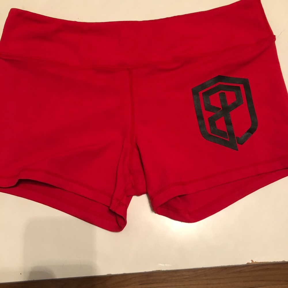 Born primitive red booty shorts